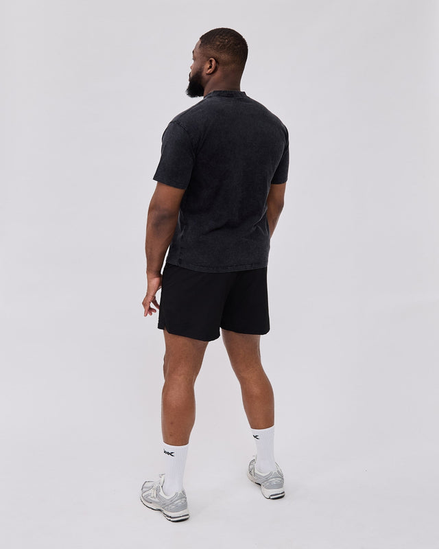 Pantaloni scurți de antrenament Caged Essential – Negru