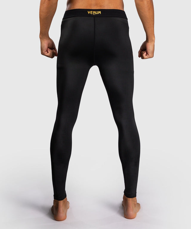 Pantaloncini a compressione Venum G-Core – Nero/Oro
