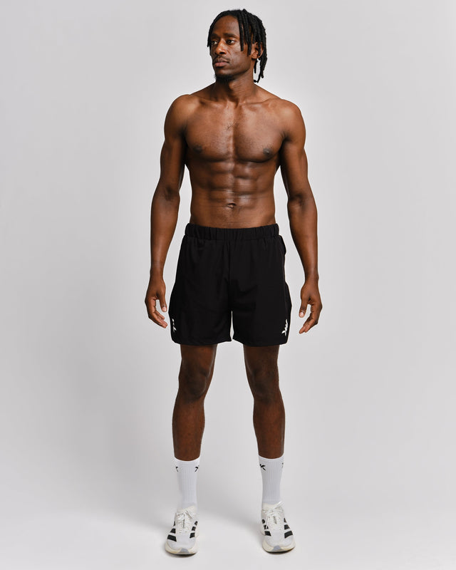 Caged 2-in-1 Løbeshorts Stride – Sort