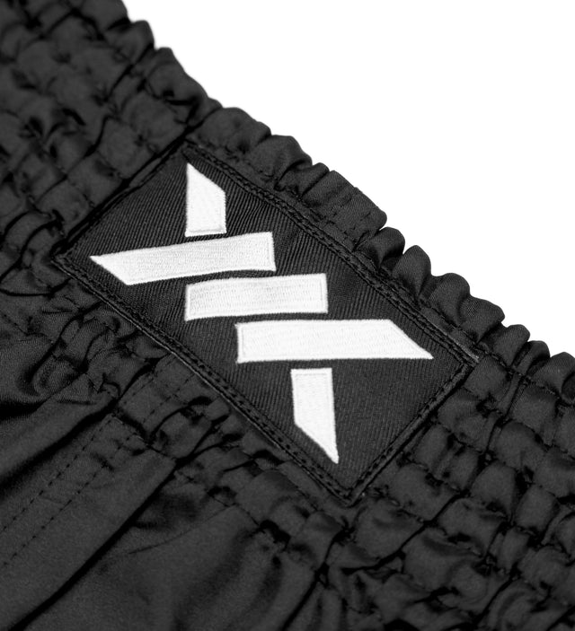 Muay Thai trenky Caged Classic – Černé/Bílé