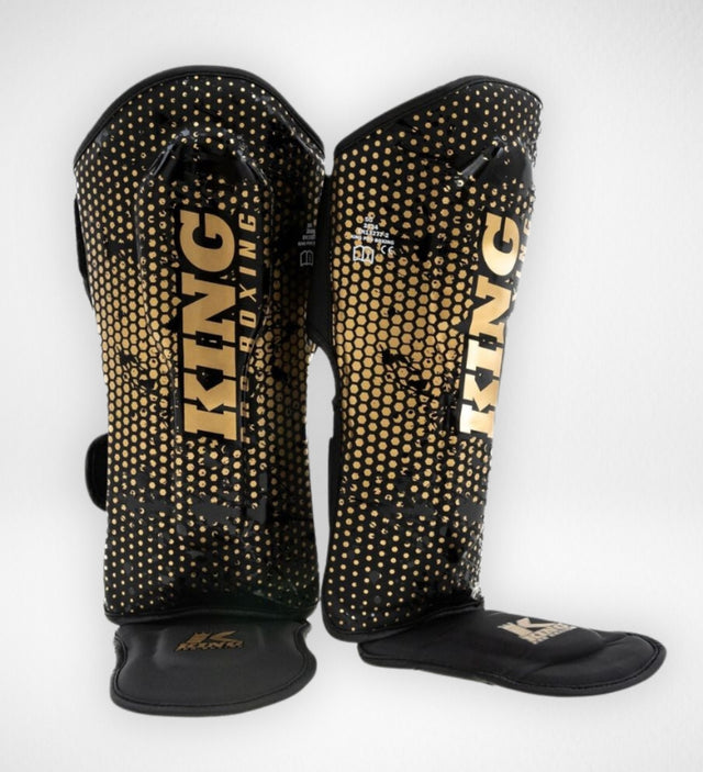 King Pro Boxing Schienbeinschoner Hexagon Kinder – Schwarz/Gold