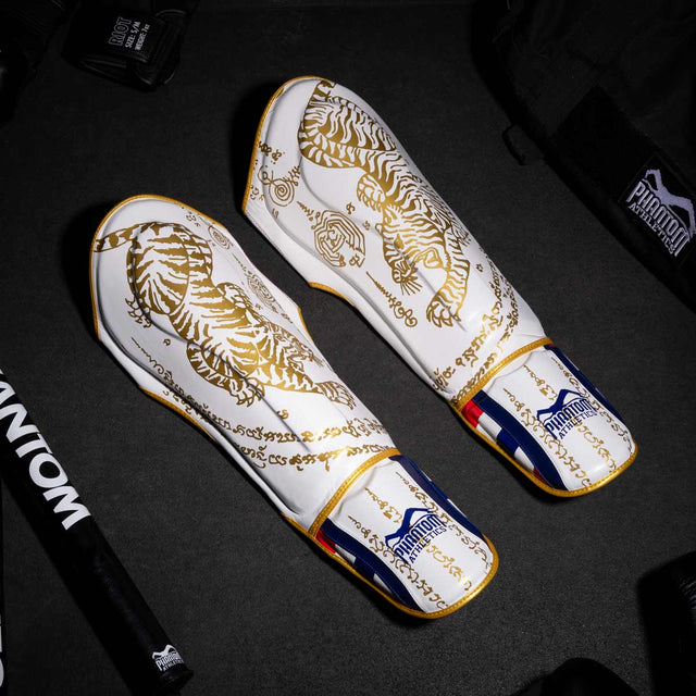 Tibiere Phantom Athletics Muay Thai – Alb/Aur