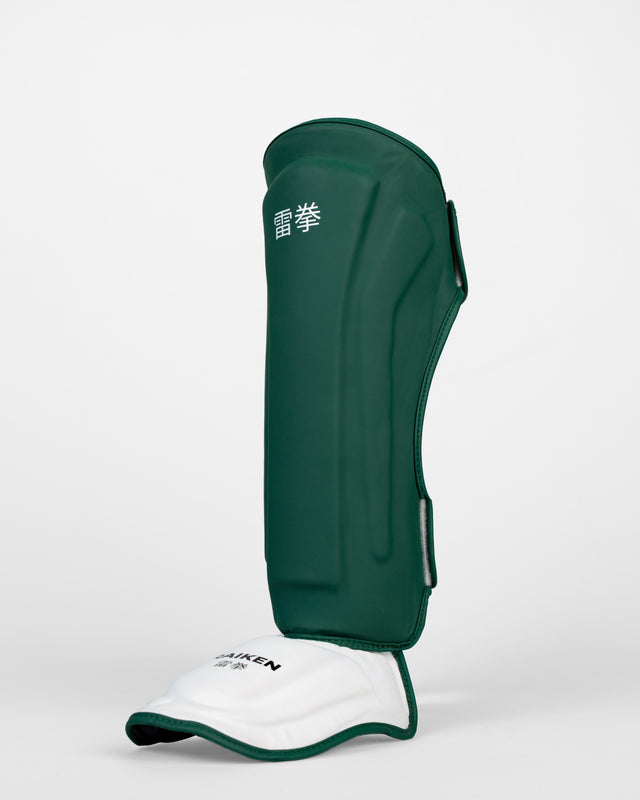 Espinilleras Raiken KAZE – Verde oscuro/Blanco