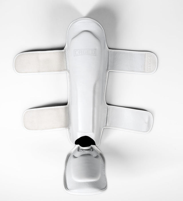 Espinilleras Caged Kickboks 'X' Series – Blanco/Blanco