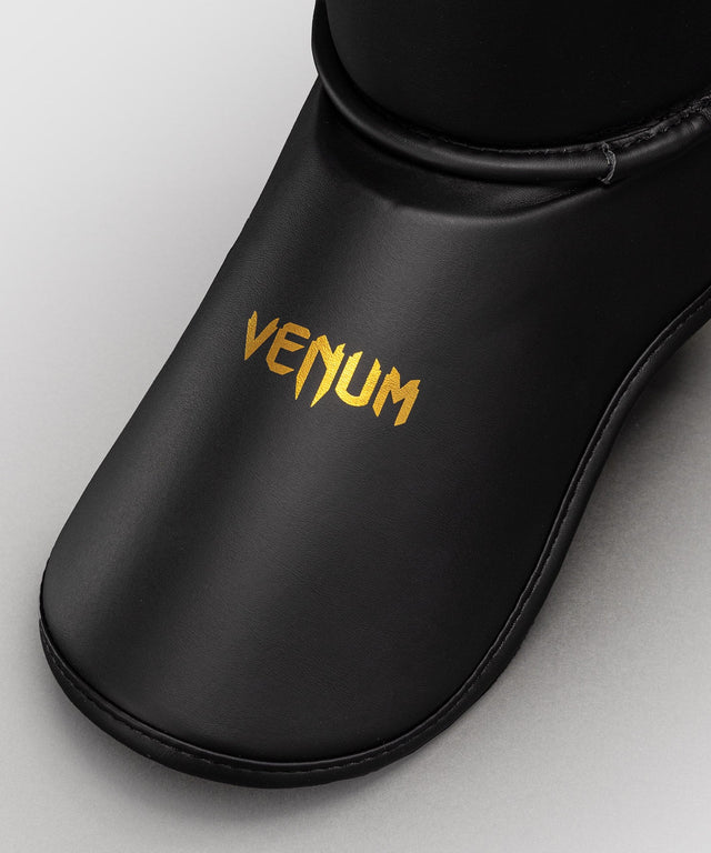 Protège-tibias Venum Contender 1.5 – Noir/Or