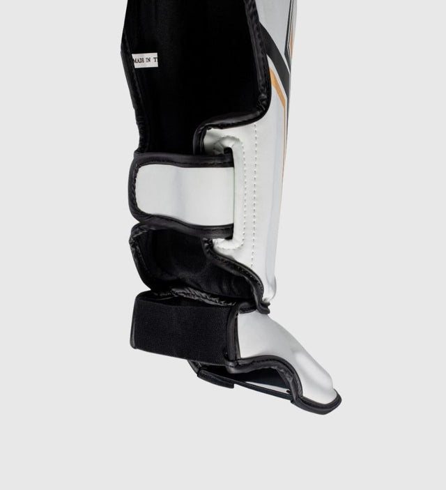 Espinilleras King Kickboxing Thor – Blanco/Negro/Oro – Espinilleras