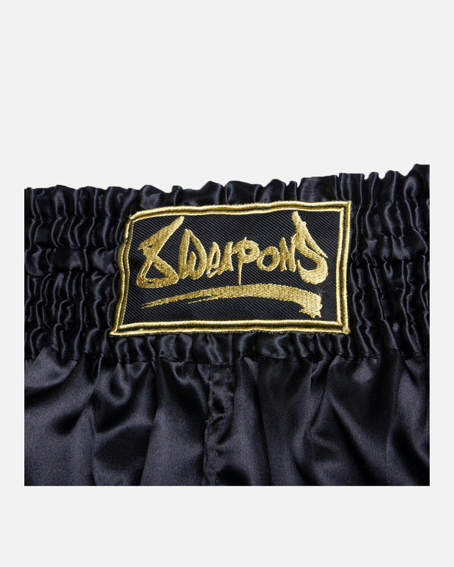 8 WEAPONS Muay Thai Shorts Strike - Zwart/Goud
