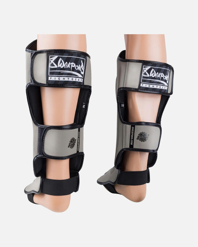Espinilleras 8 WEAPONS Unlimited 2.0 – Arena/Negro
