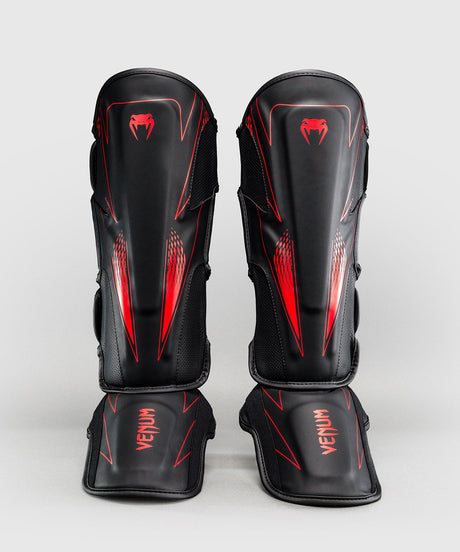 Espinilleras Venum Amazonia Reborn – Negro/Rojo
