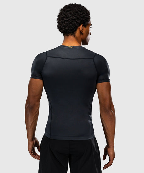 Venum Rashguard Attack Kurzarm – Schwarz/Gold
