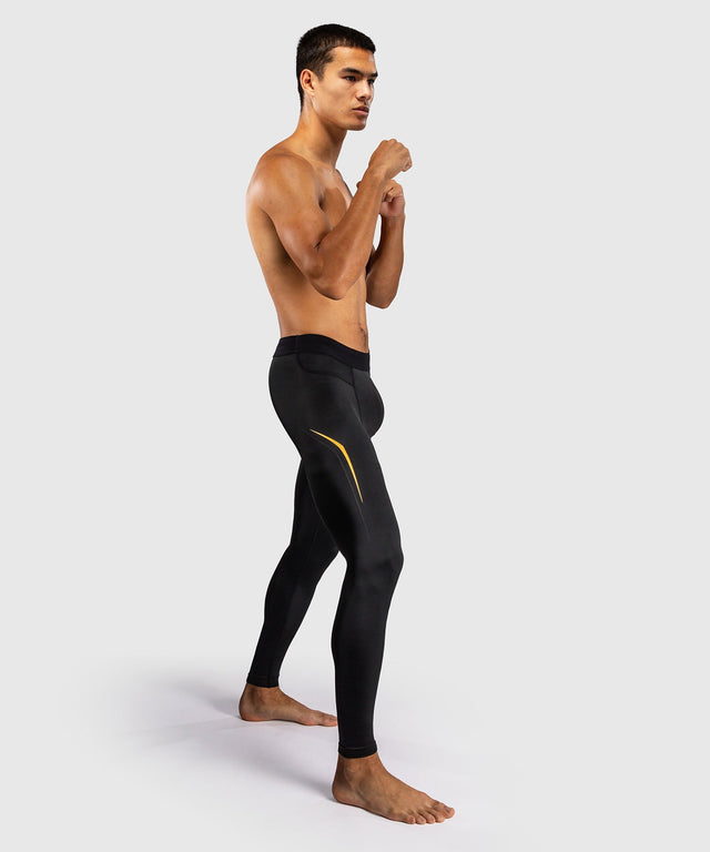 Pantaloncini a compressione Venum G-Core – Nero/Oro