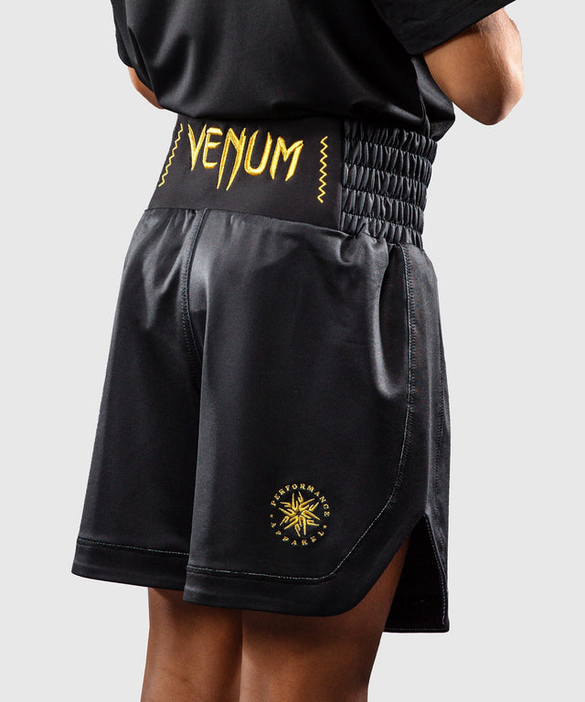 Pantaloni scurți de box Venum Attack – Negru/Aur – Copii