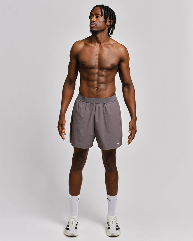 Caged Training Shorts Essential – Grau
