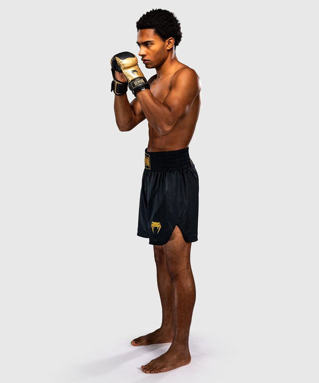 Calções de boxe Venum Attack – Preto/Ouro