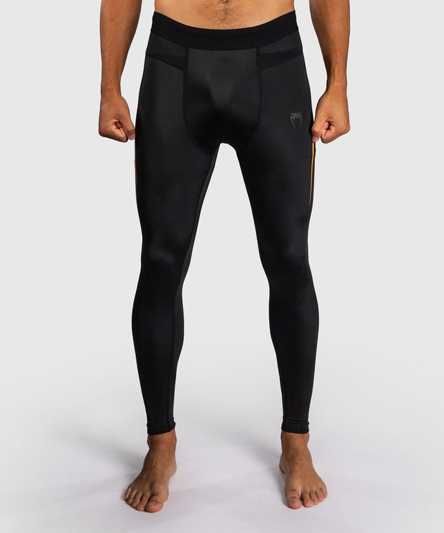 Pantaloncini a compressione Venum G-Core – Nero/Oro