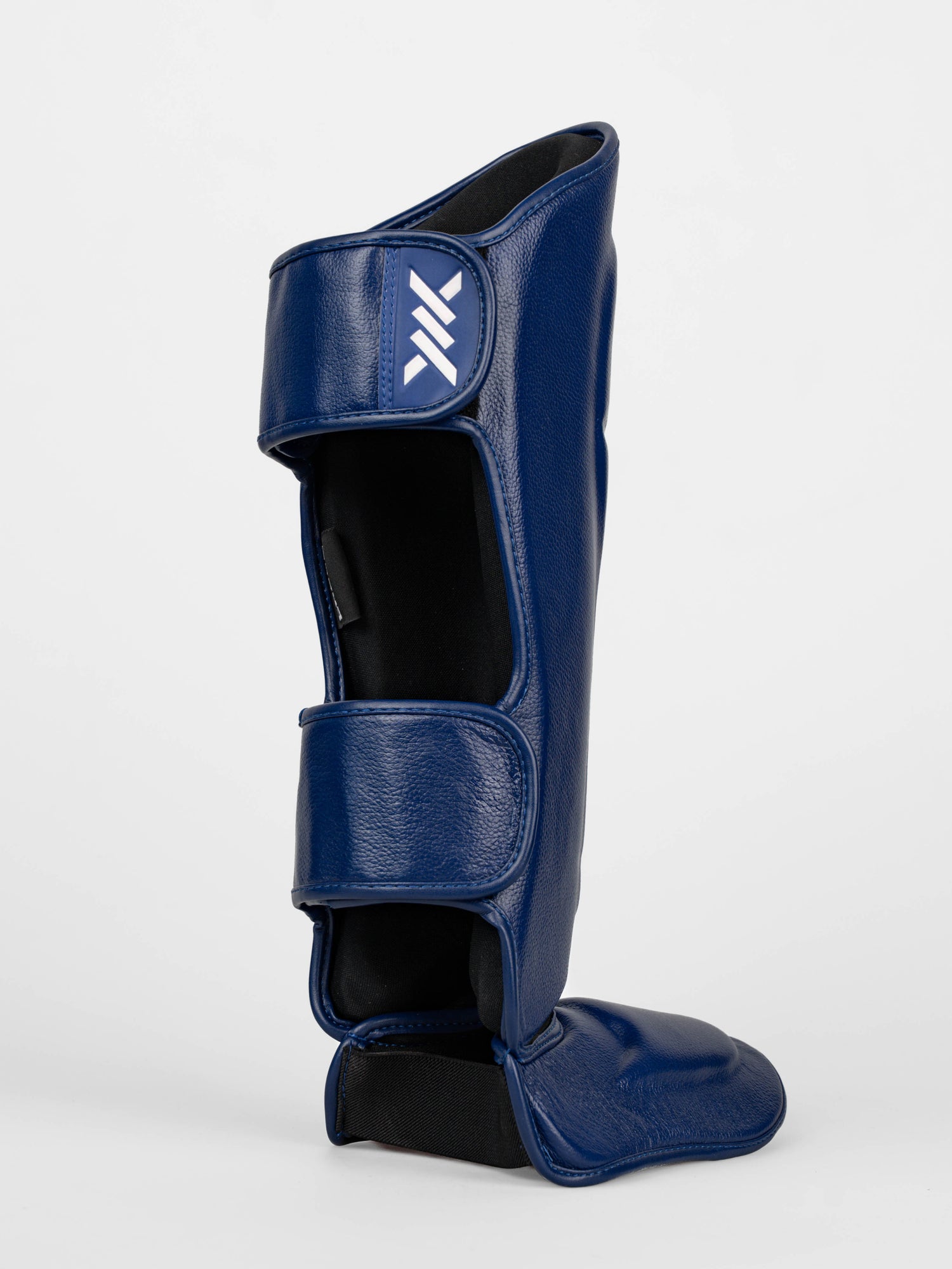 Caged Benskydd 'X' Series – Navy Blå/Vit