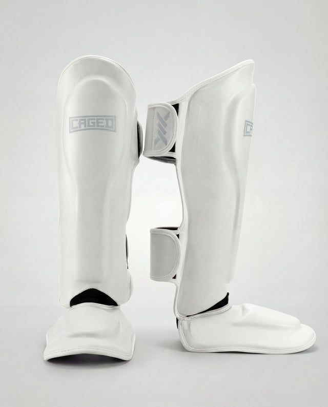 Espinilleras Caged 'X' Series – Blanco/Blanco