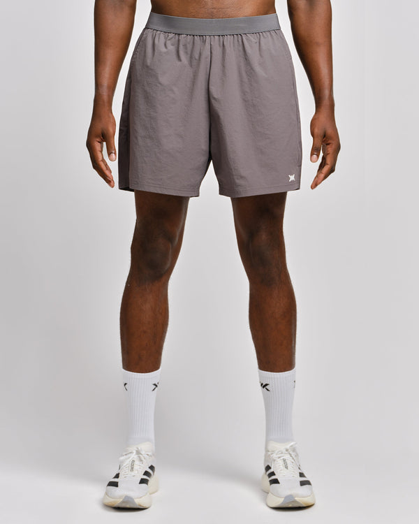 Caged Training Shorts Essential – Grau