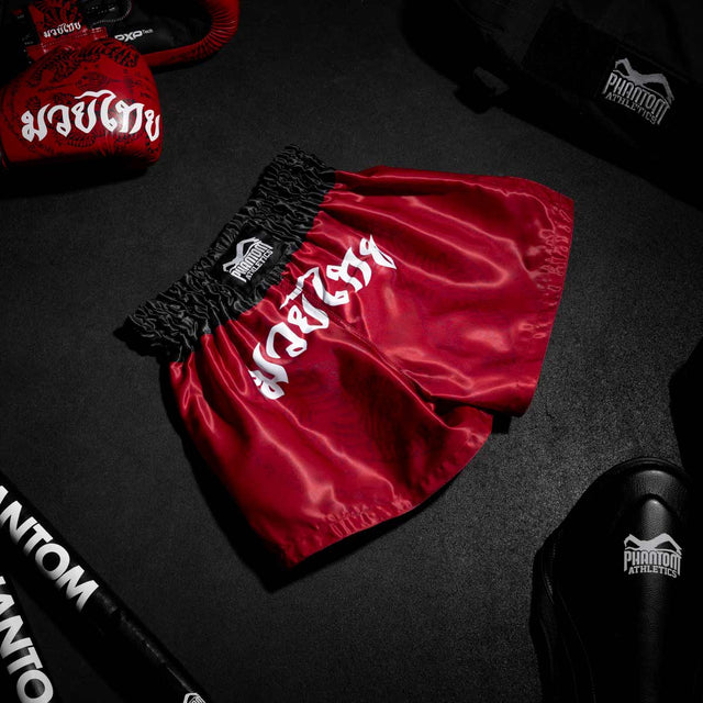 Pantaloni scurți Muay Thai Phantom Athletics Sak Yant – Roșu