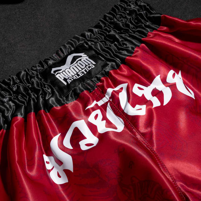Pantaloni scurți Muay Thai Phantom Athletics Sak Yant – Roșu