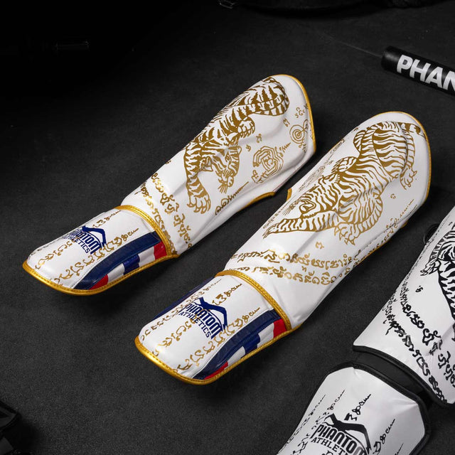 Tibiere Phantom Athletics Muay Thai – Alb/Aur