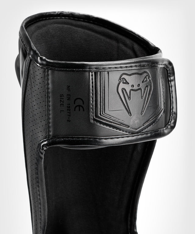 Chrániče holení Venum Elite Evo – Černé/Černé