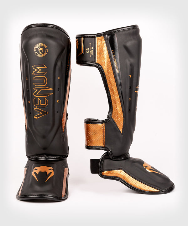 Venum Benskydd Kickboxning Elite Evo – Svart/Brons