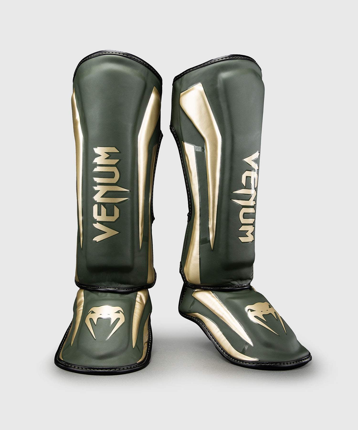 Espinilleras Venum Elite – Caqui/Oro