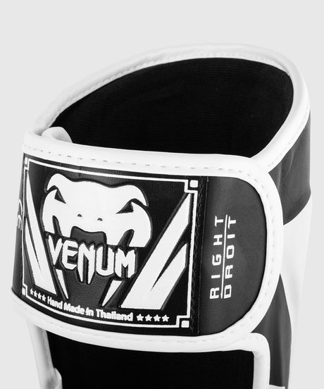 Protège-tibias Venum Elite – Noir/Blanc