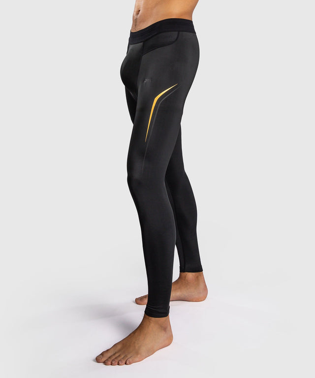Pantaloncini a compressione Venum G-Core – Nero/Oro