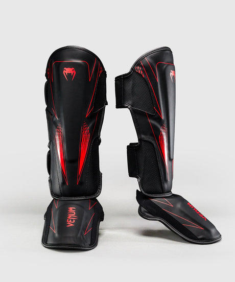 Espinilleras Venum Amazonia Reborn – Negro/Rojo