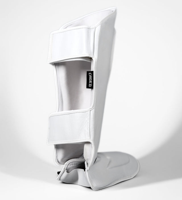 Espinilleras Caged Kickboks 'X' Series – Blanco/Blanco
