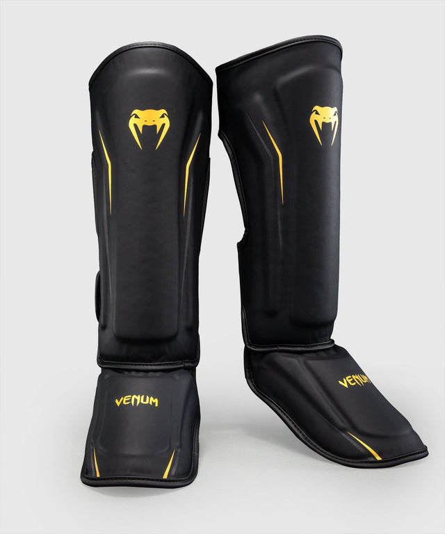 Espinilleras Venum G-Core – Negro/Oro