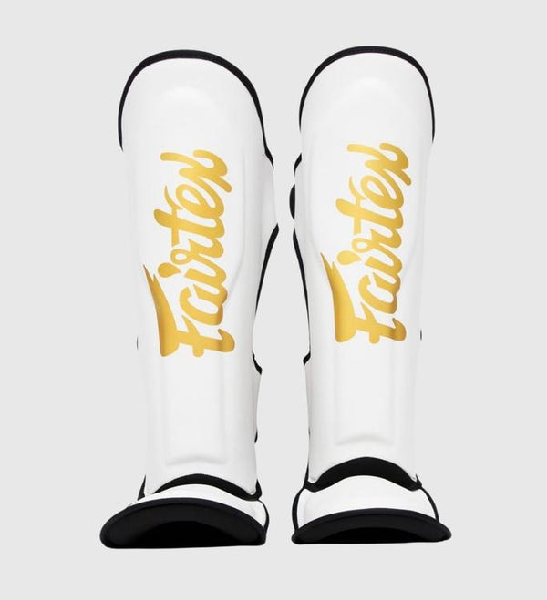 Espinilleras Fairtex FXB – Blanco/Oro