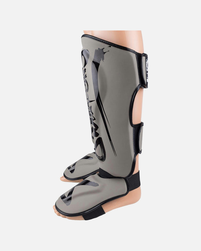 Espinilleras 8 WEAPONS Unlimited 2.0 – Arena/Negro