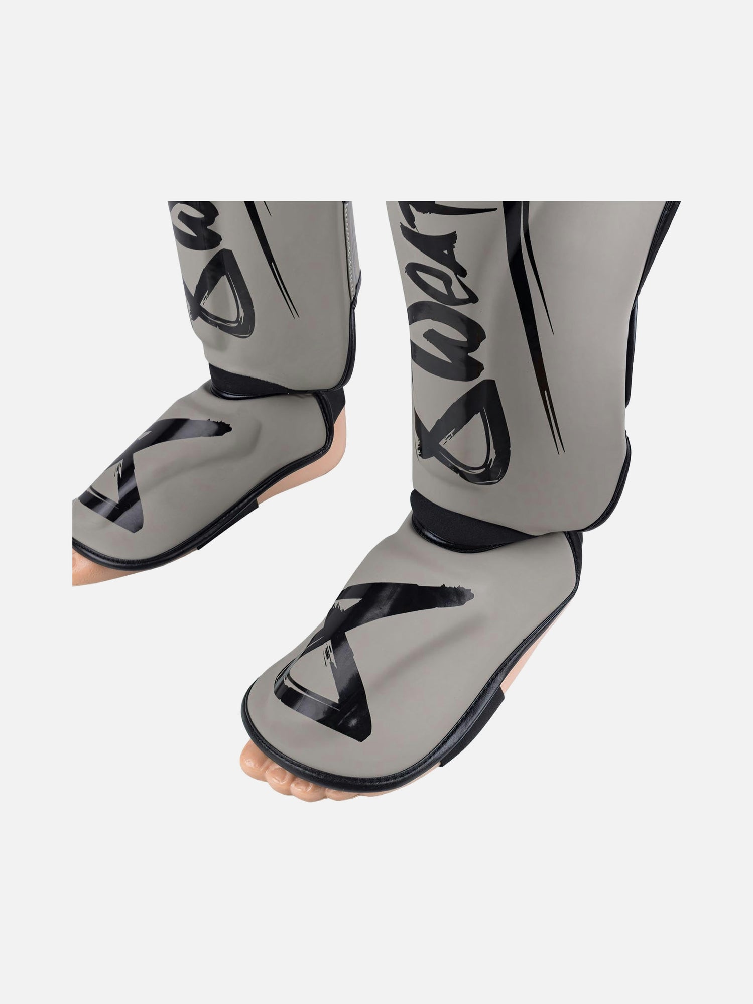 Espinilleras 8 WEAPONS Unlimited 2.0 – Arena/Negro