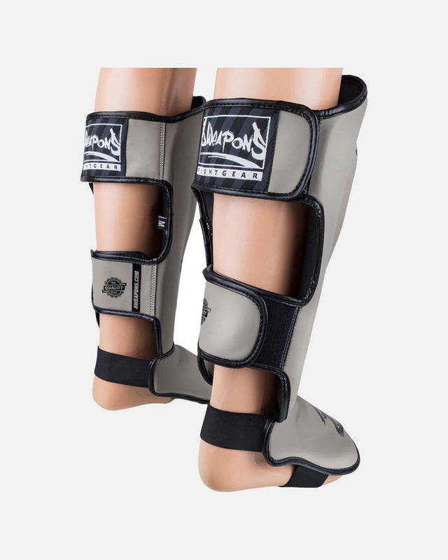 Espinilleras 8 WEAPONS Unlimited 2.0 – Arena/Negro