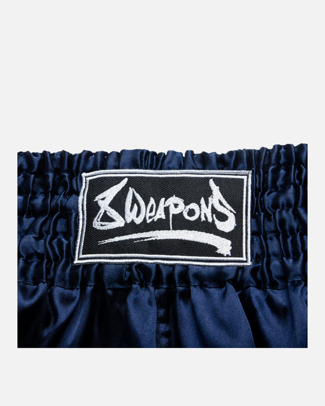 8 WEAPONS Muay Thai-shorts Strike – Mörkblå/Vit