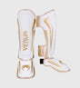 Espinilleras Venum Elite – Blanco/Oro